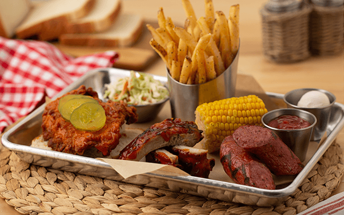 Photo of 'Tony’s BBQ Trio Sampler' meal.
