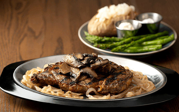 Photo of 'Sizzling Ribeye 12oz.' meal.