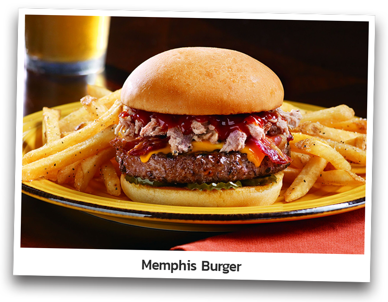 Picture the Memphis Burger that consists of a Juicy premium beef patty topped with house-made pulled pork, melted cheddar cheese, bacon, red onion, pickles, and Original BBQ sauce. Presented on a round plate with a side of fries.