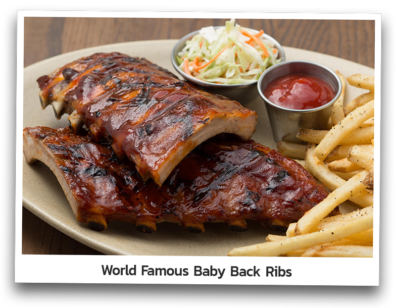 Full rack of Baby Back ribs, tender, lean pork loin basted in Original BBQ sauce. Served with coleslaw and fries on an oval plate.